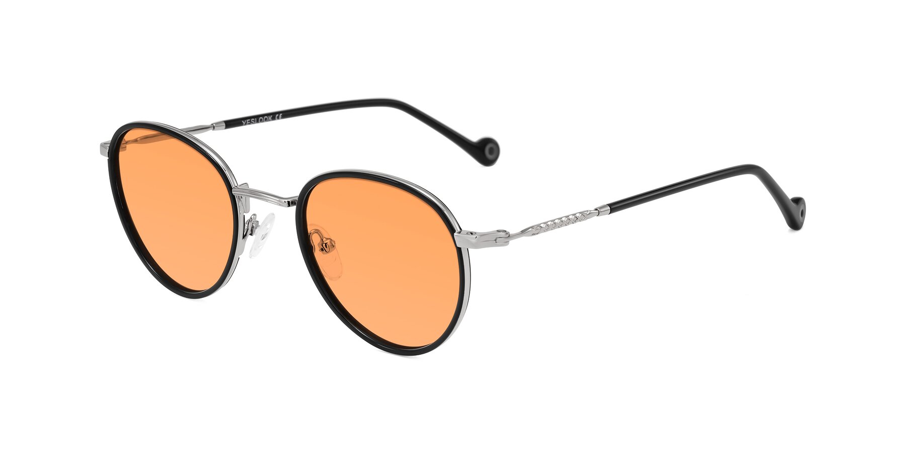 Angle of Hoosen in Black/Silver with Medium Orange Tinted Lenses