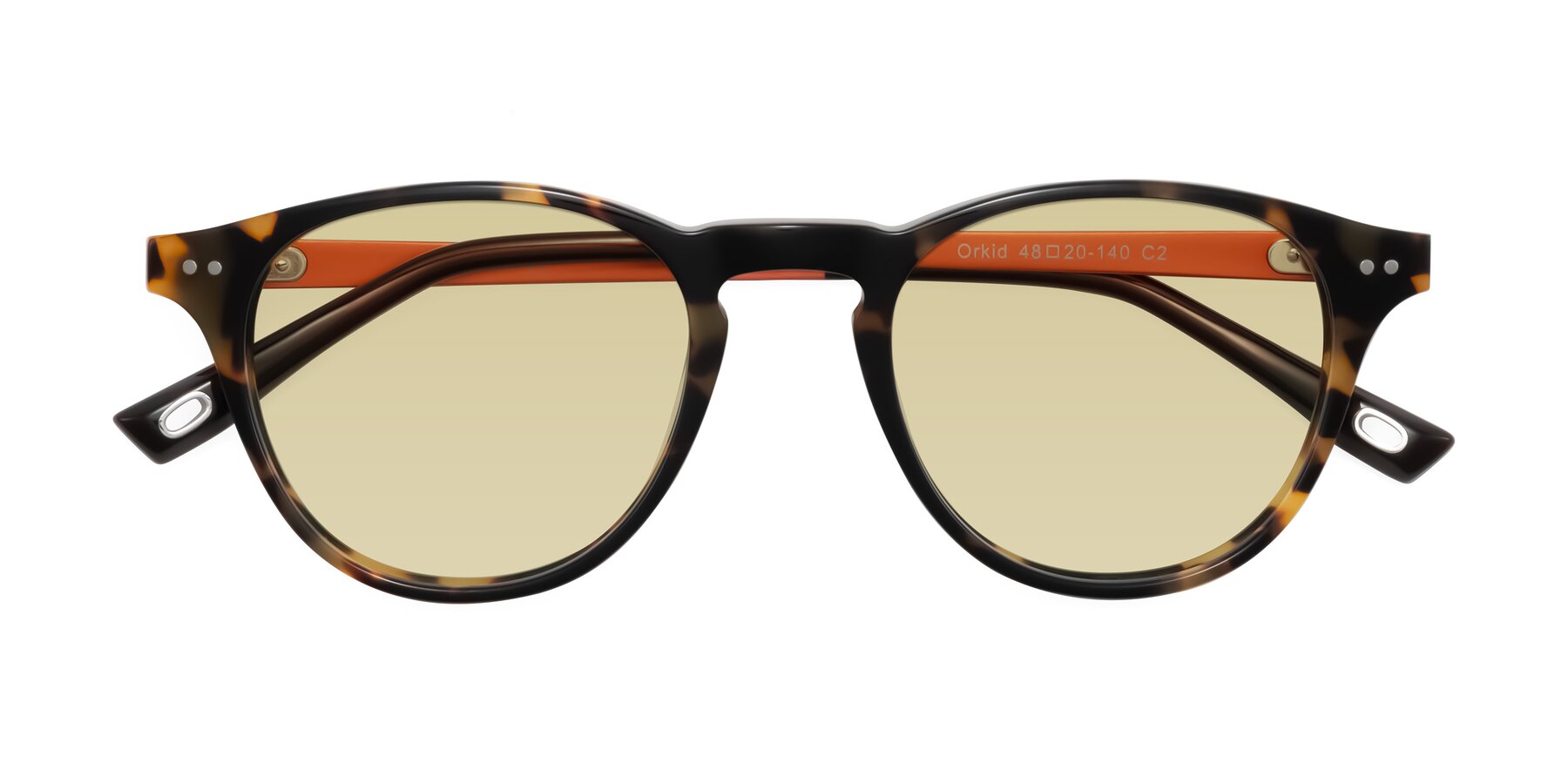 Folded Front of Orkid in Tortoise/Orange with Light Champagne Tinted Lenses