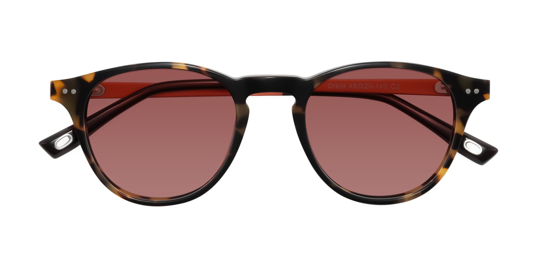 Folded Front of Orkid in Tortoise/Orange with Garnet Tinted Lenses