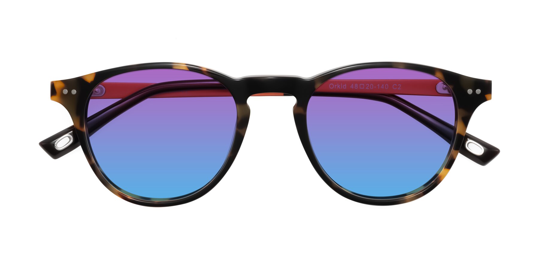 Folded Front of Orkid in Tortoise/Orange with Purple / Blue Gradient Lenses