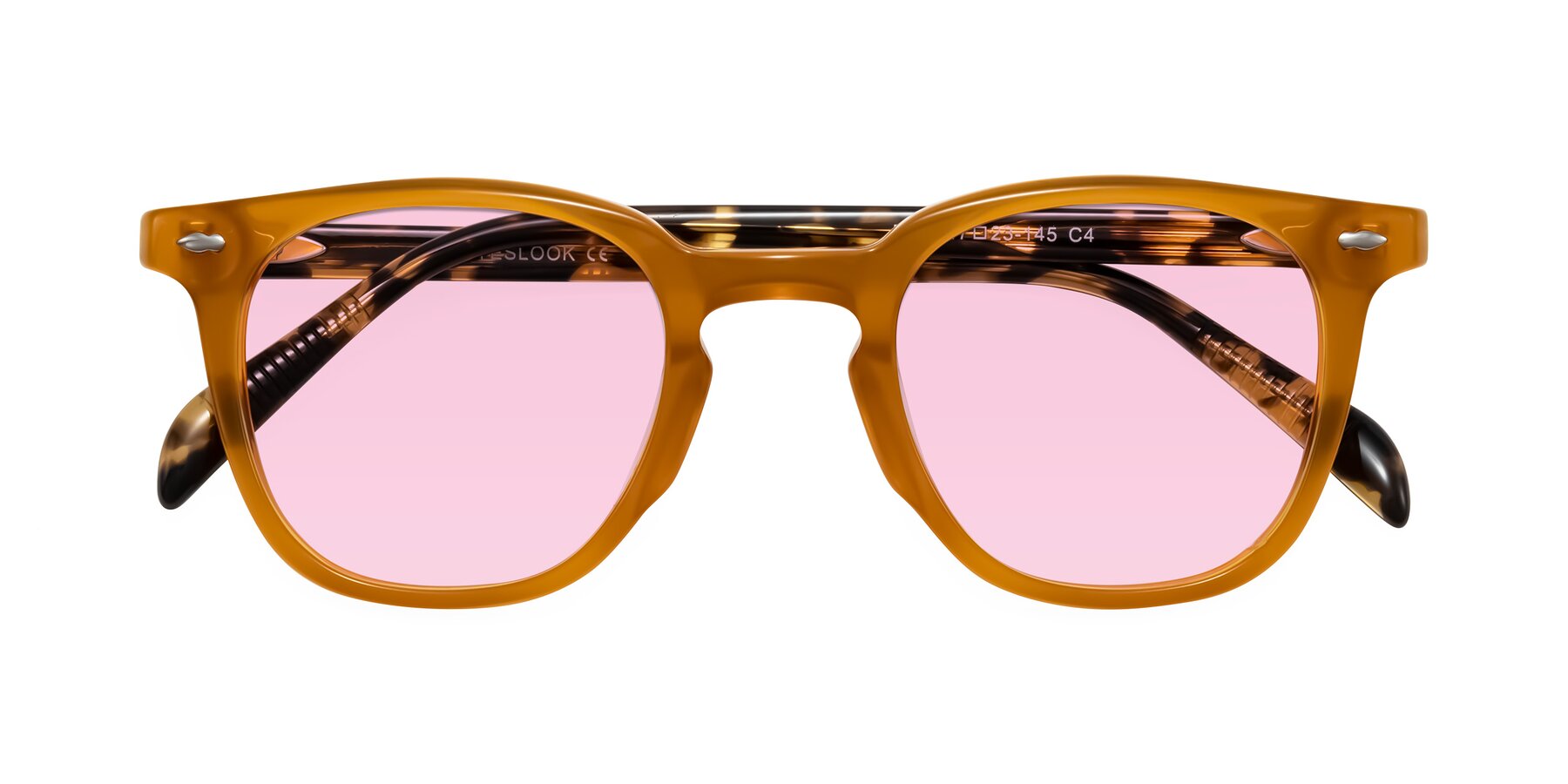 Folded Front of Palu in Honey/Tortoise with Light Pink Tinted Lenses