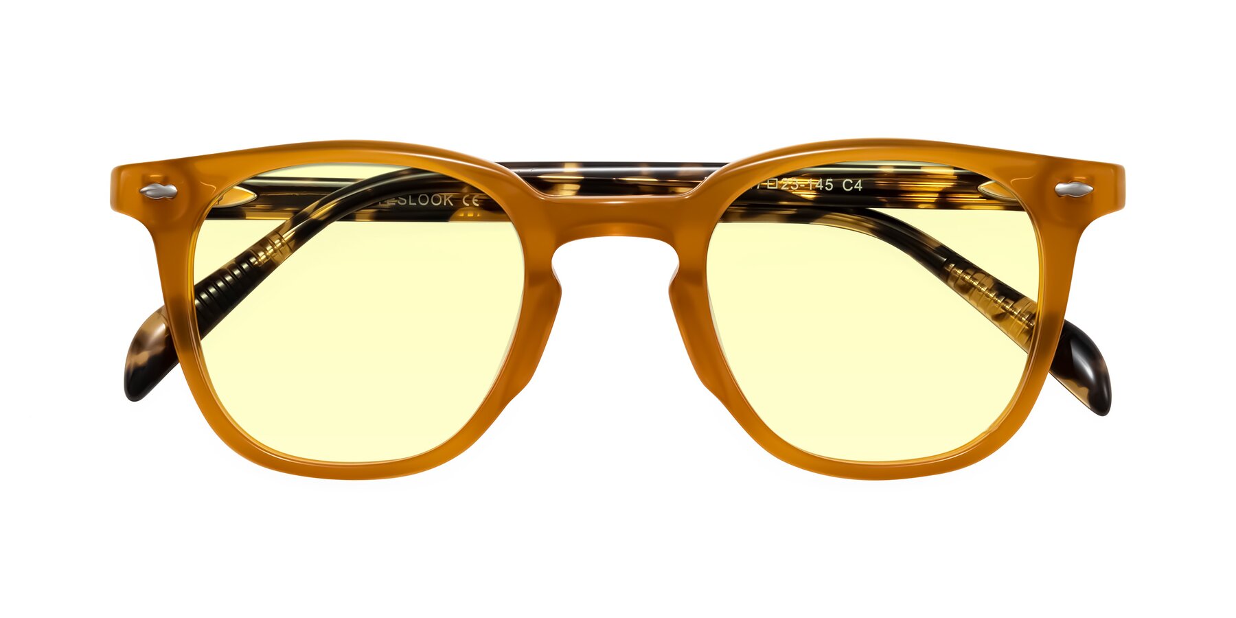 Folded Front of Palu in Honey/Tortoise with Light Yellow Tinted Lenses