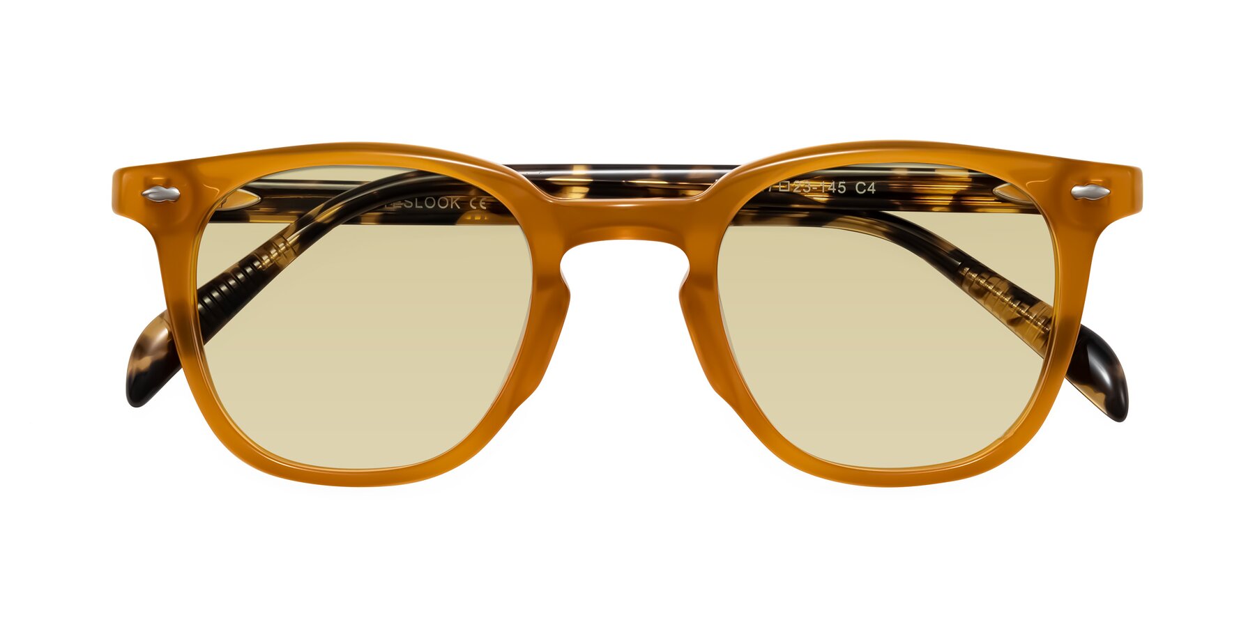 Folded Front of Palu in Honey/Tortoise with Light Champagne Tinted Lenses