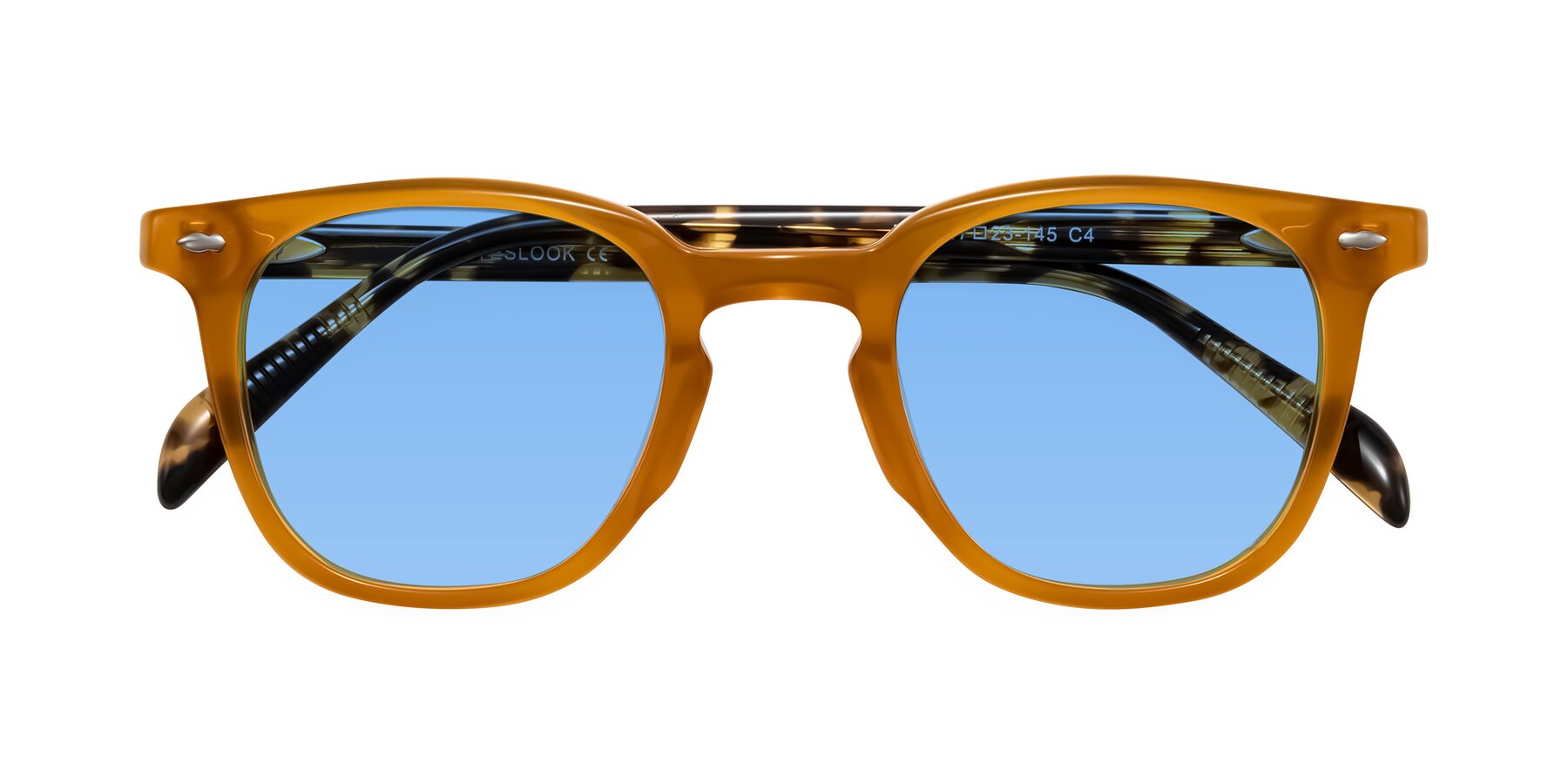Folded Front of Palu in Honey/Tortoise with Medium Blue Tinted Lenses