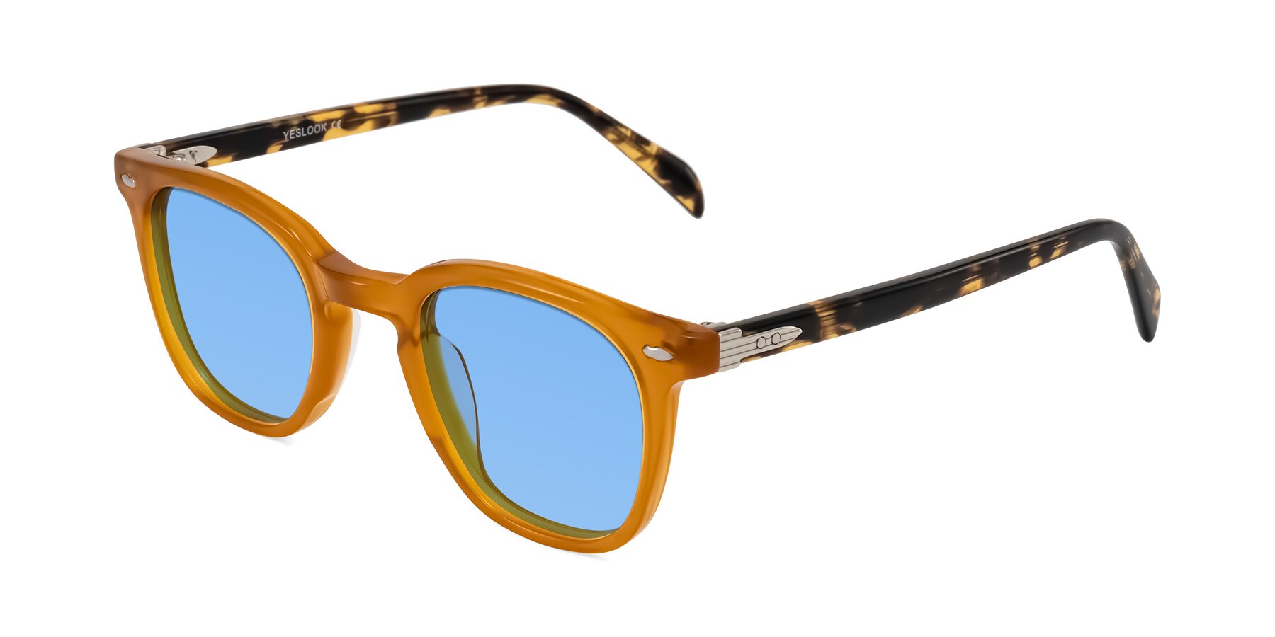 Angle of Palu in Honey/Tortoise with Medium Blue Tinted Lenses