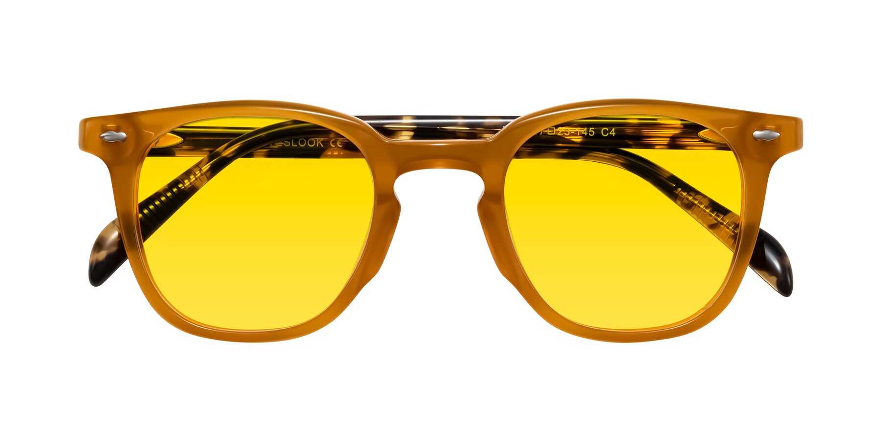 Folded Front of Palu in Honey/Tortoise with Yellow Tinted Lenses
