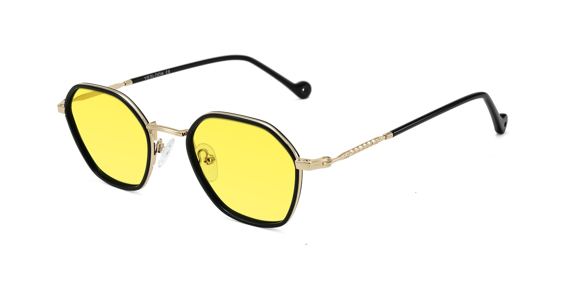 Angle of Dalon in Black/Gold with Medium Yellow Tinted Lenses