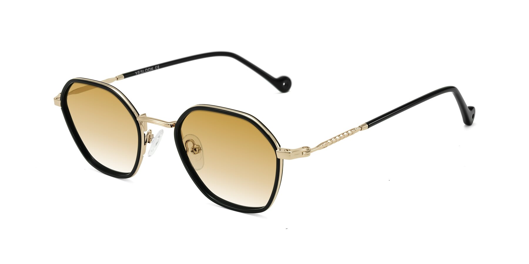 Angle of Dalon in Black/Gold with Champagne Gradient Lenses