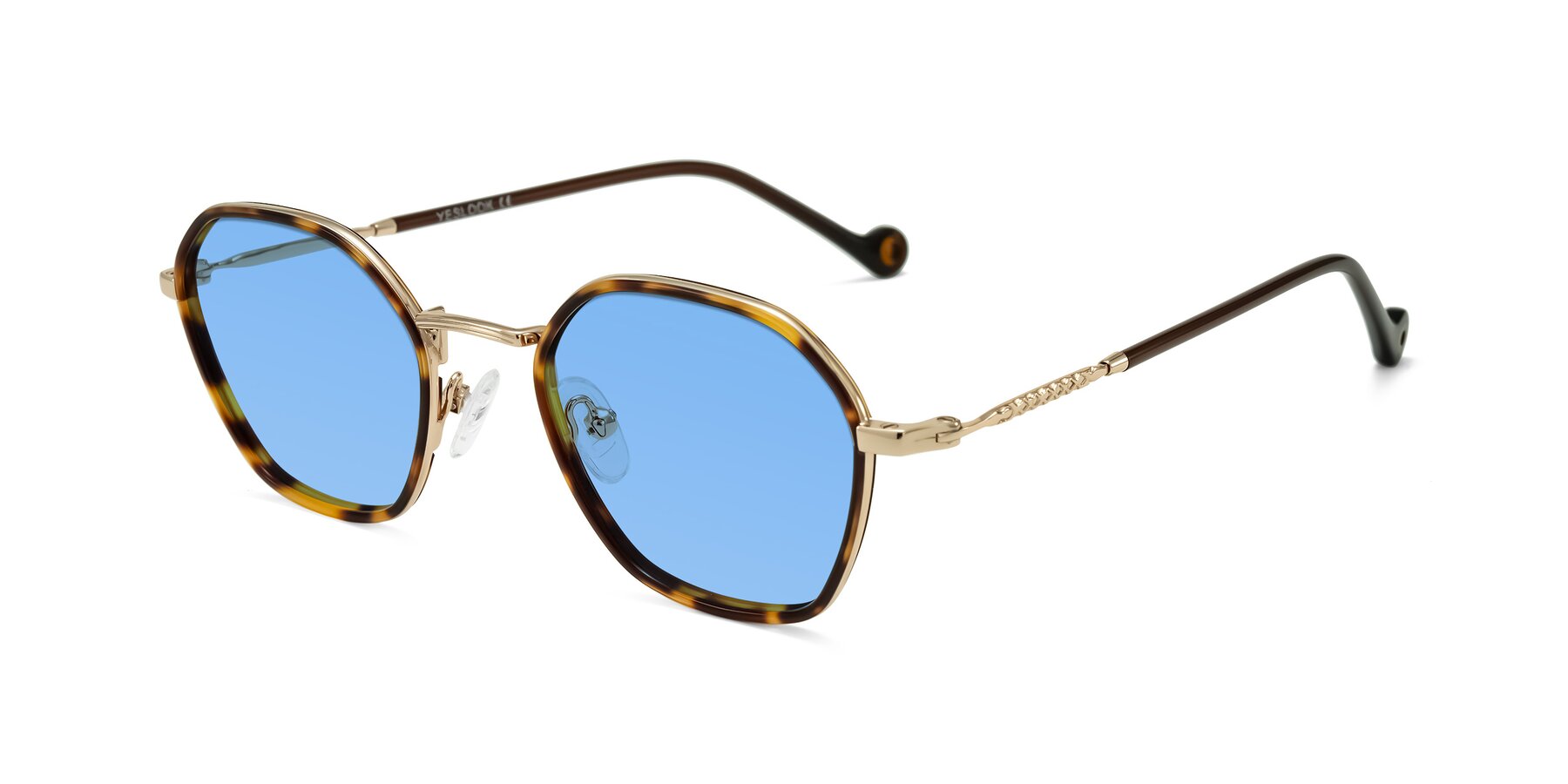 Angle of Dalon in Leopard-Print/Gold with Medium Blue Tinted Lenses