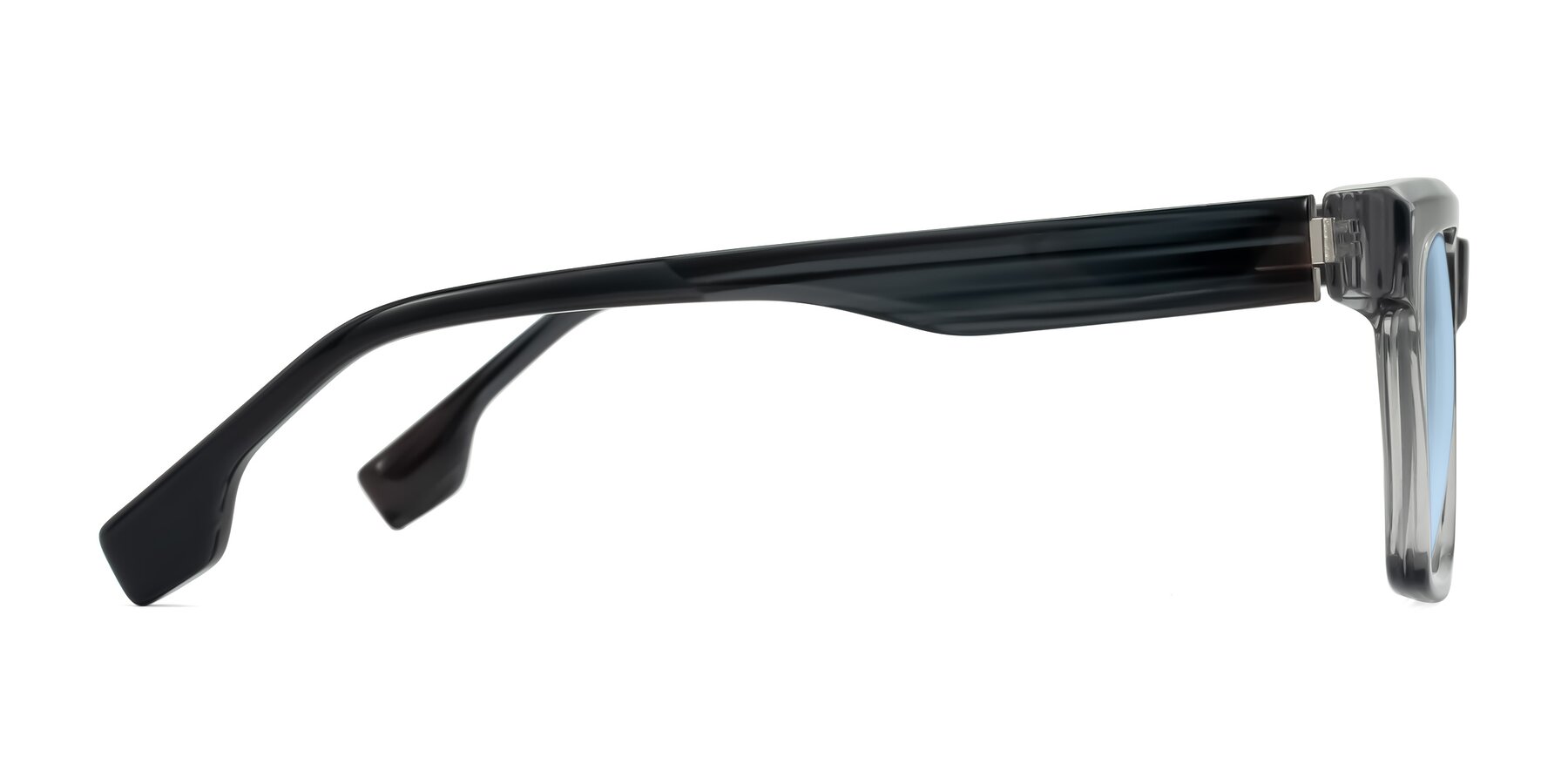 Side of Kieta in Transparent Gray/Gray Brown Striped with Light Blue Tinted Lenses