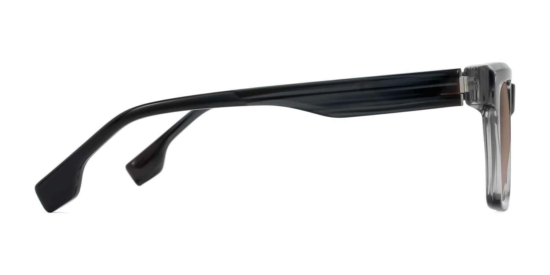 Side of Kieta in Transparent Gray/Gray Brown Striped with Medium Brown Tinted Lenses