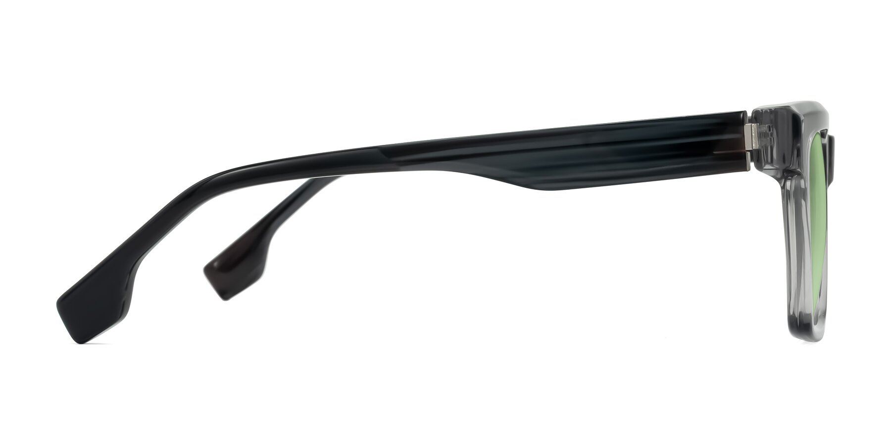 Side of Kieta in Transparent Gray/Gray Brown Striped with Medium Green Tinted Lenses