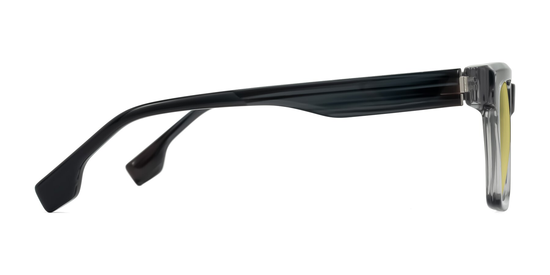 Side of Kieta in Transparent Gray/Gray Brown Striped with Medium Champagne Tinted Lenses