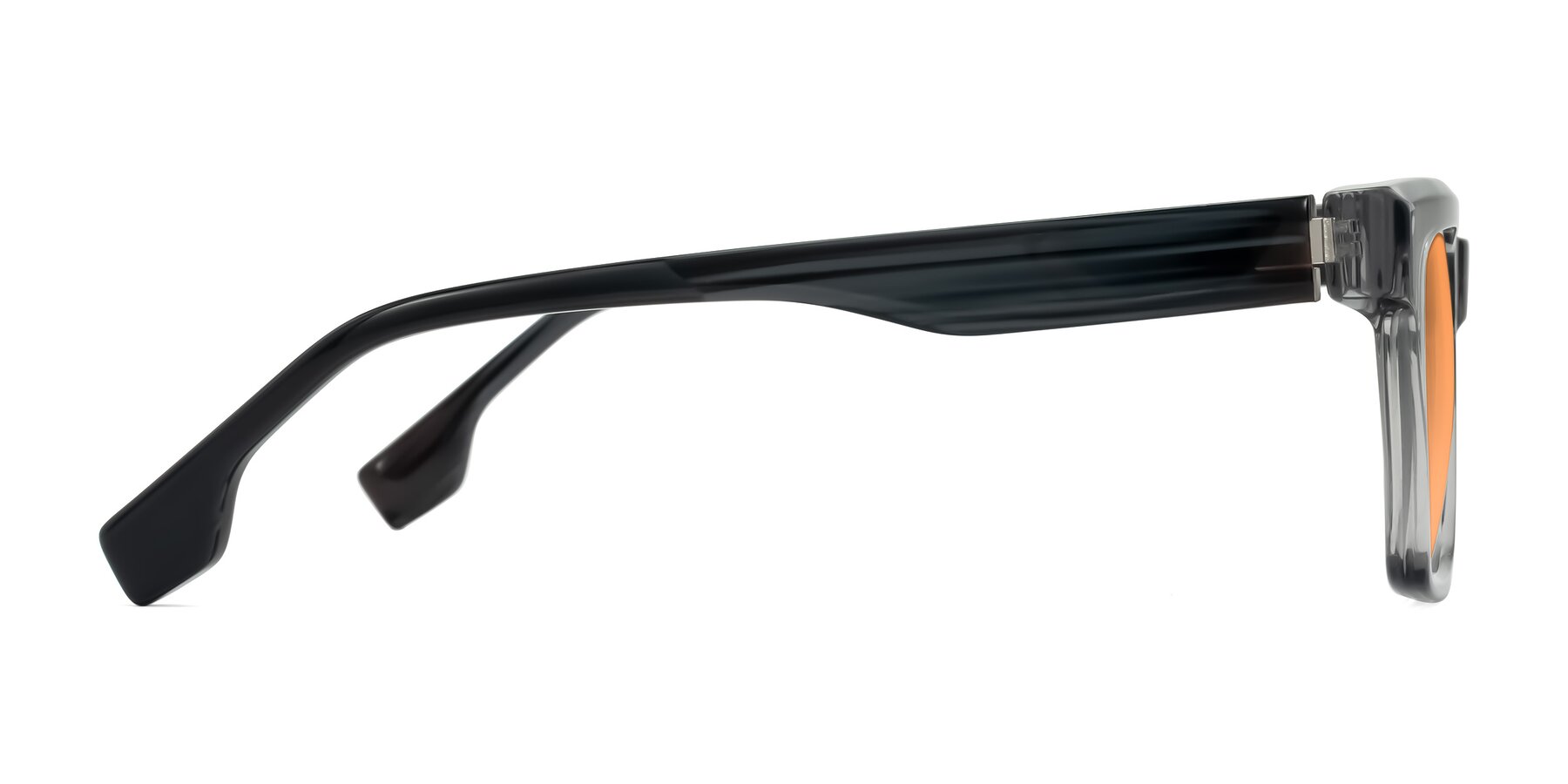 Side of Kieta in Transparent Gray/Gray Brown Striped with Medium Orange Tinted Lenses