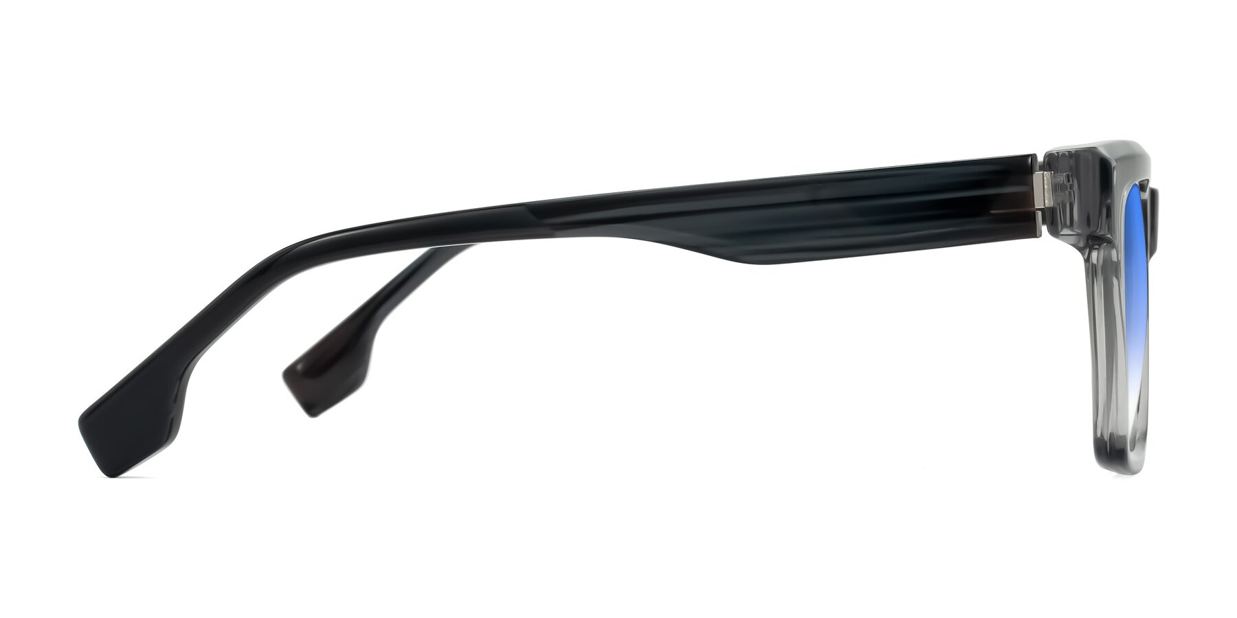 Side of Kieta in Transparent Gray/Gray Brown Striped with Blue Gradient Lenses