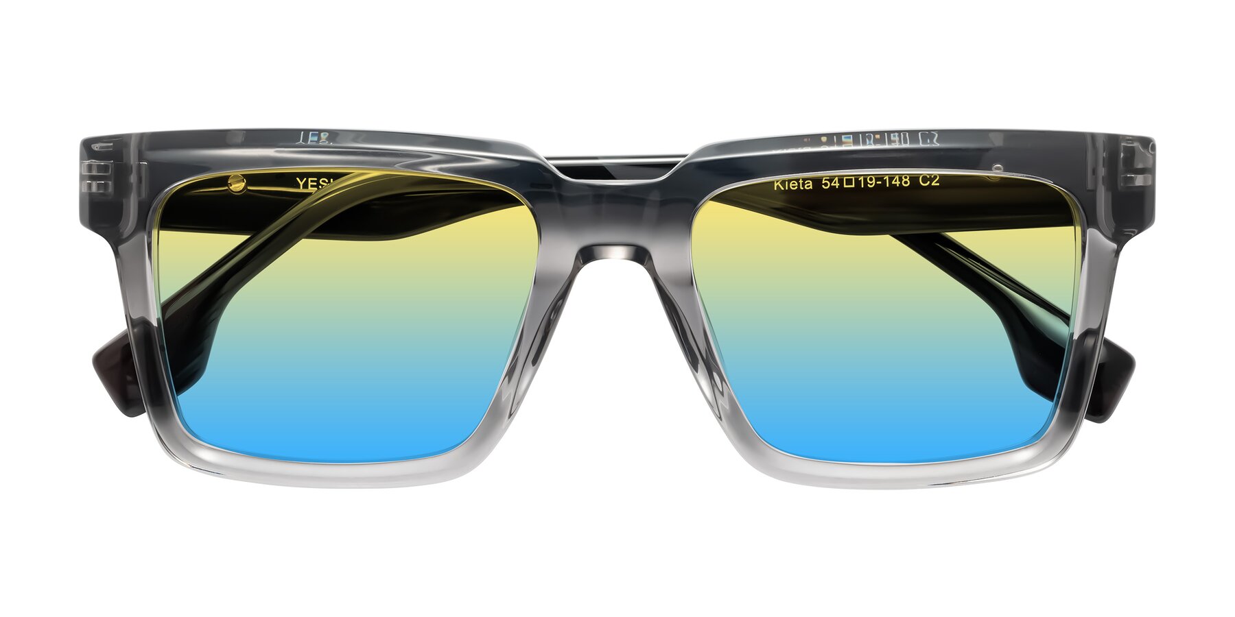 Folded Front of Kieta in Transparent Gray/Gray Brown Striped with Yellow / Blue Gradient Lenses