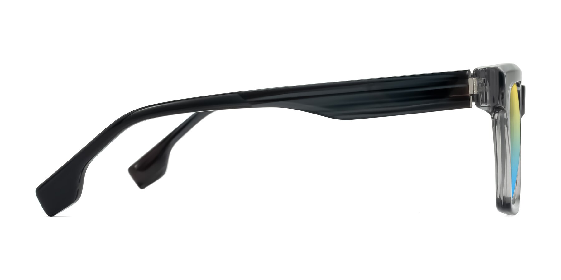 Side of Kieta in Transparent Gray/Gray Brown Striped with Yellow / Blue Gradient Lenses