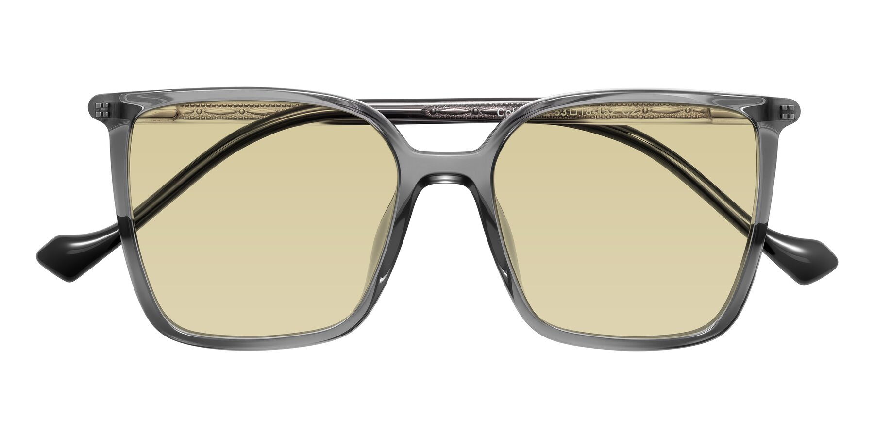 Folded Front of Colemers in Transparent Gray with Light Champagne Tinted Lenses