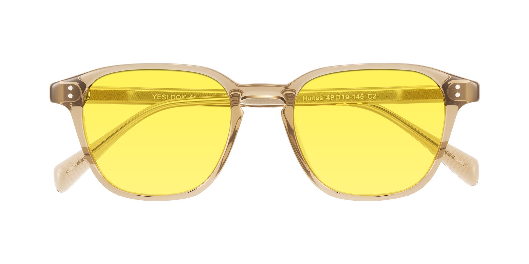 Folded Front of Huites in Champagne with Medium Yellow Tinted Lenses