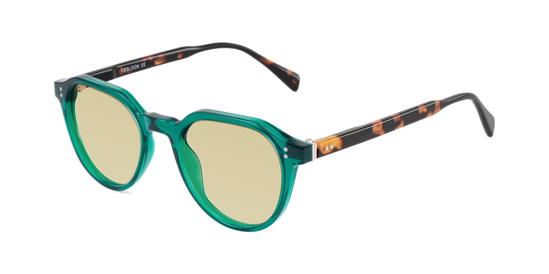 Angle of Cotaii in Emerald/Tortoise with Light Champagne Tinted Lenses