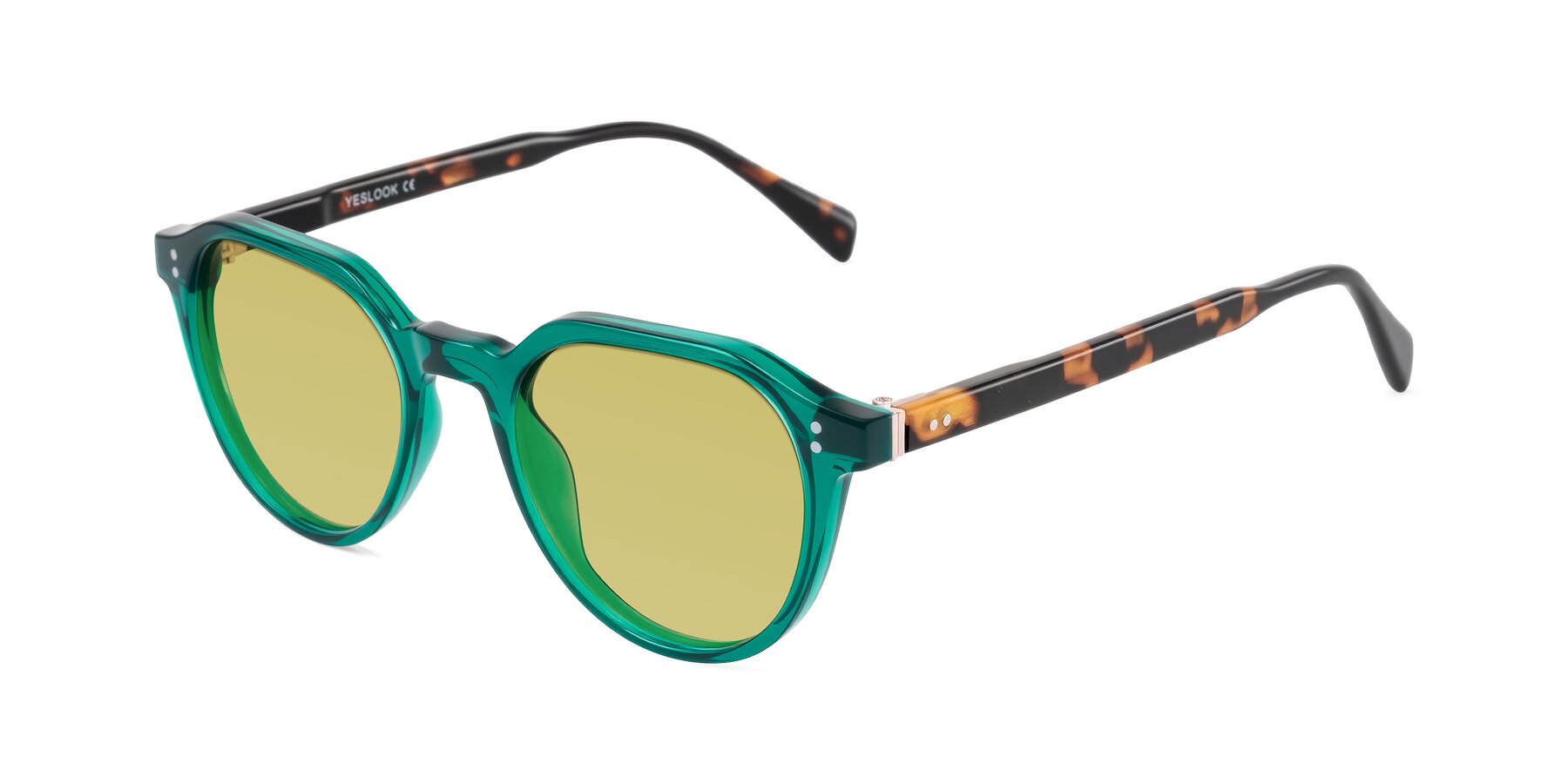 Angle of Cotaii in Emerald/Tortoise with Medium Champagne Tinted Lenses