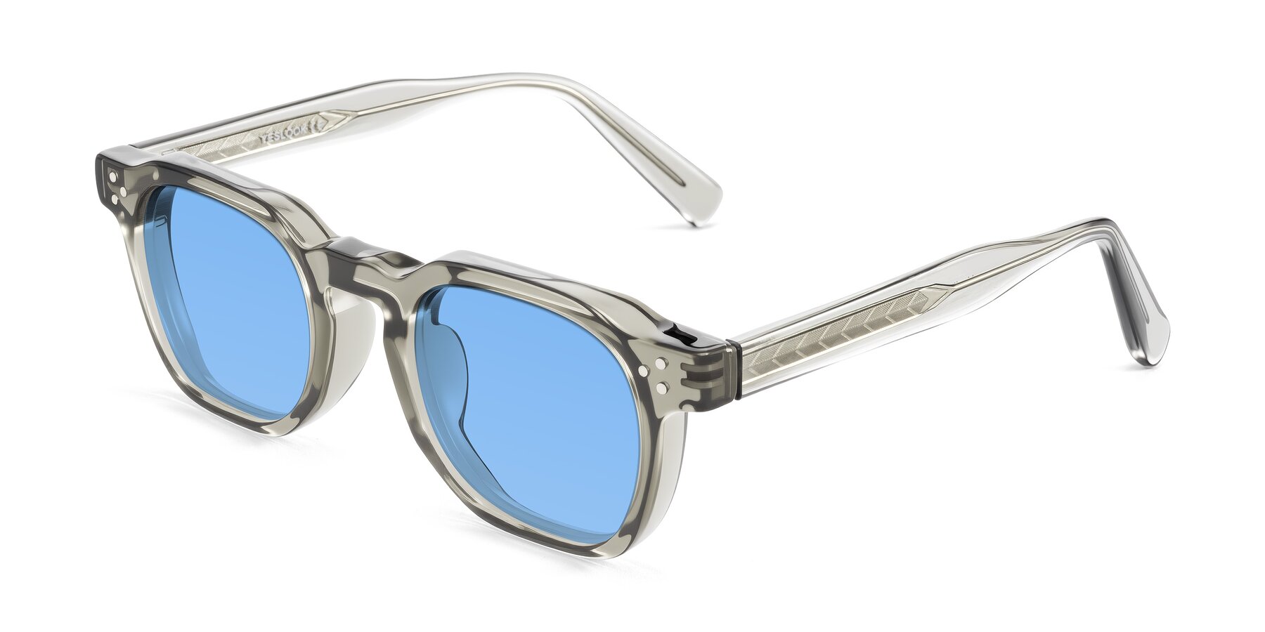 Angle of Muzik in Light Gray to Charcoal Shift with Medium Blue Tinted Lenses