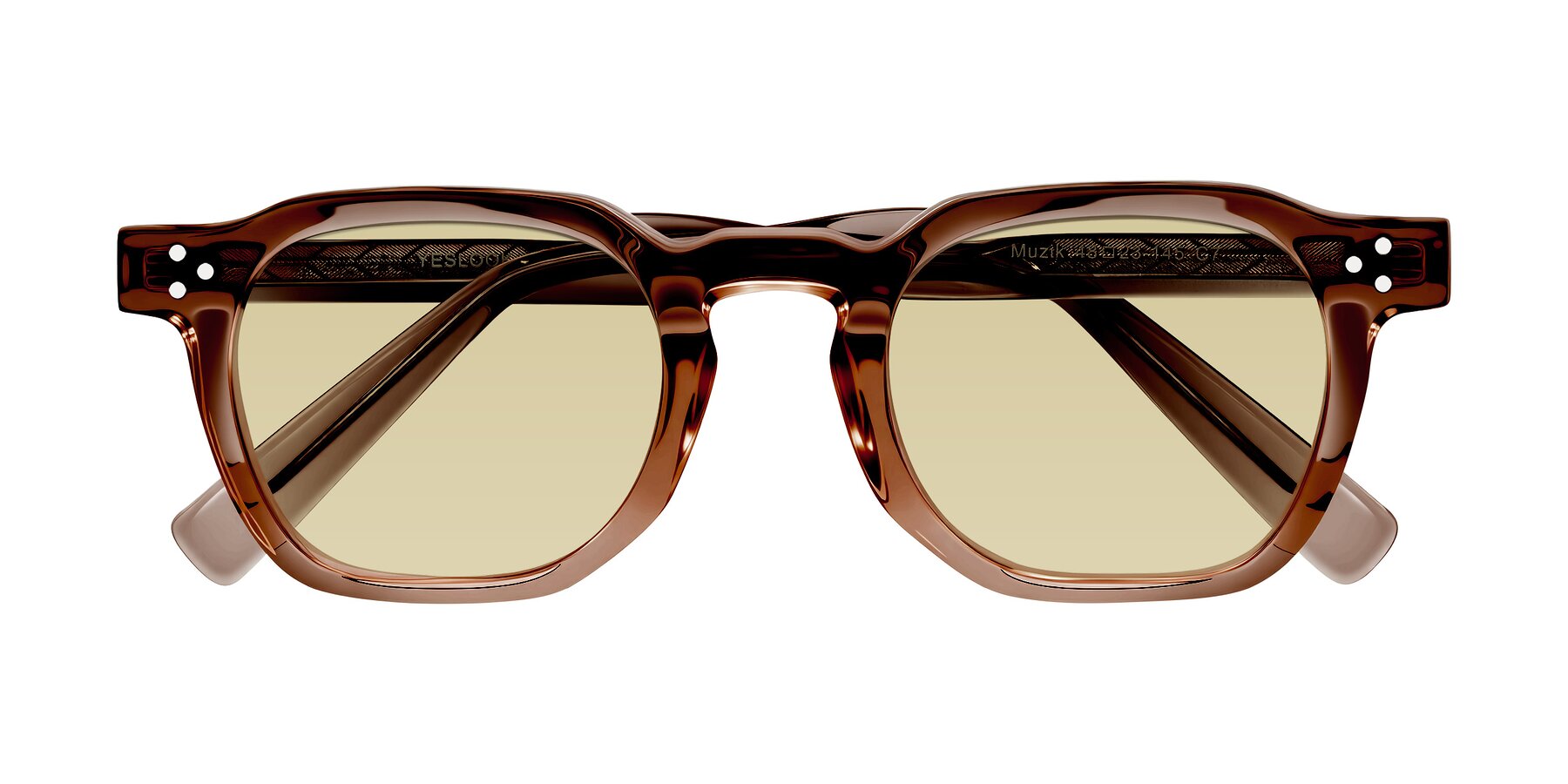 Folded Front of Muzik in Champagne to Dark Brown Shift with Light Champagne Tinted Lenses