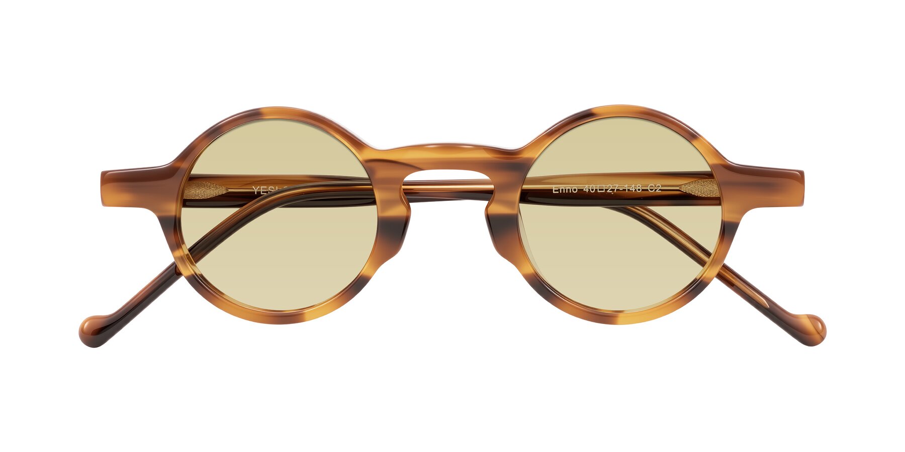 Folded Front of Enno in Amber Striped with Light Champagne Tinted Lenses
