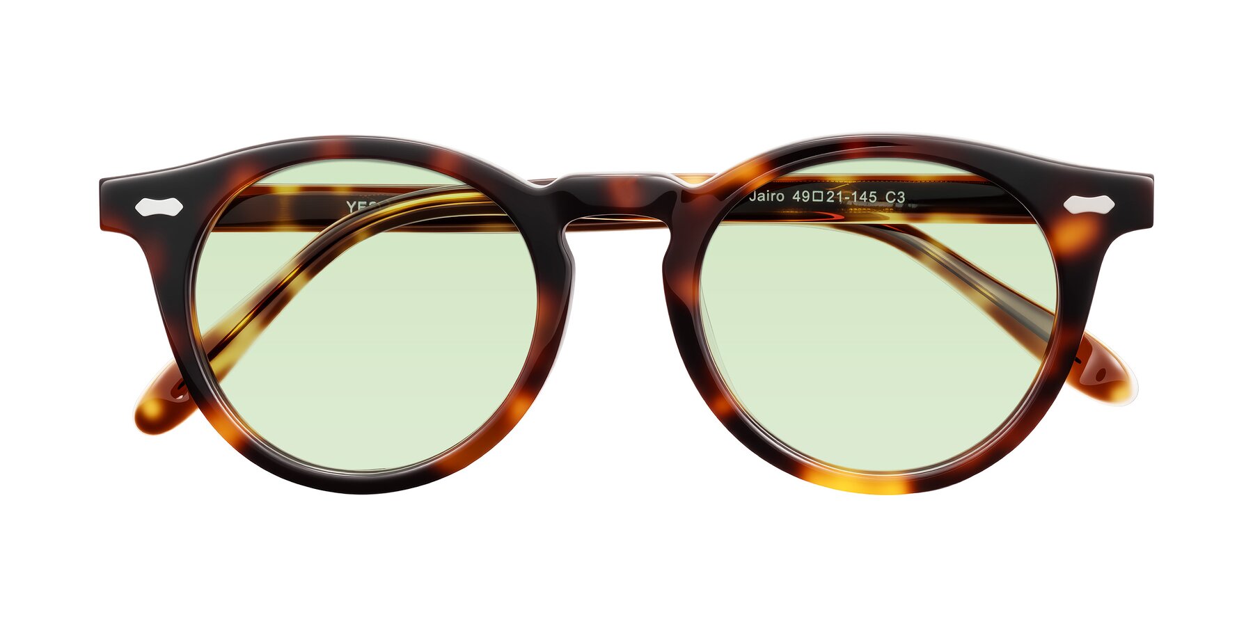 Folded Front of Jairo in Tortoise with Light Green Tinted Lenses