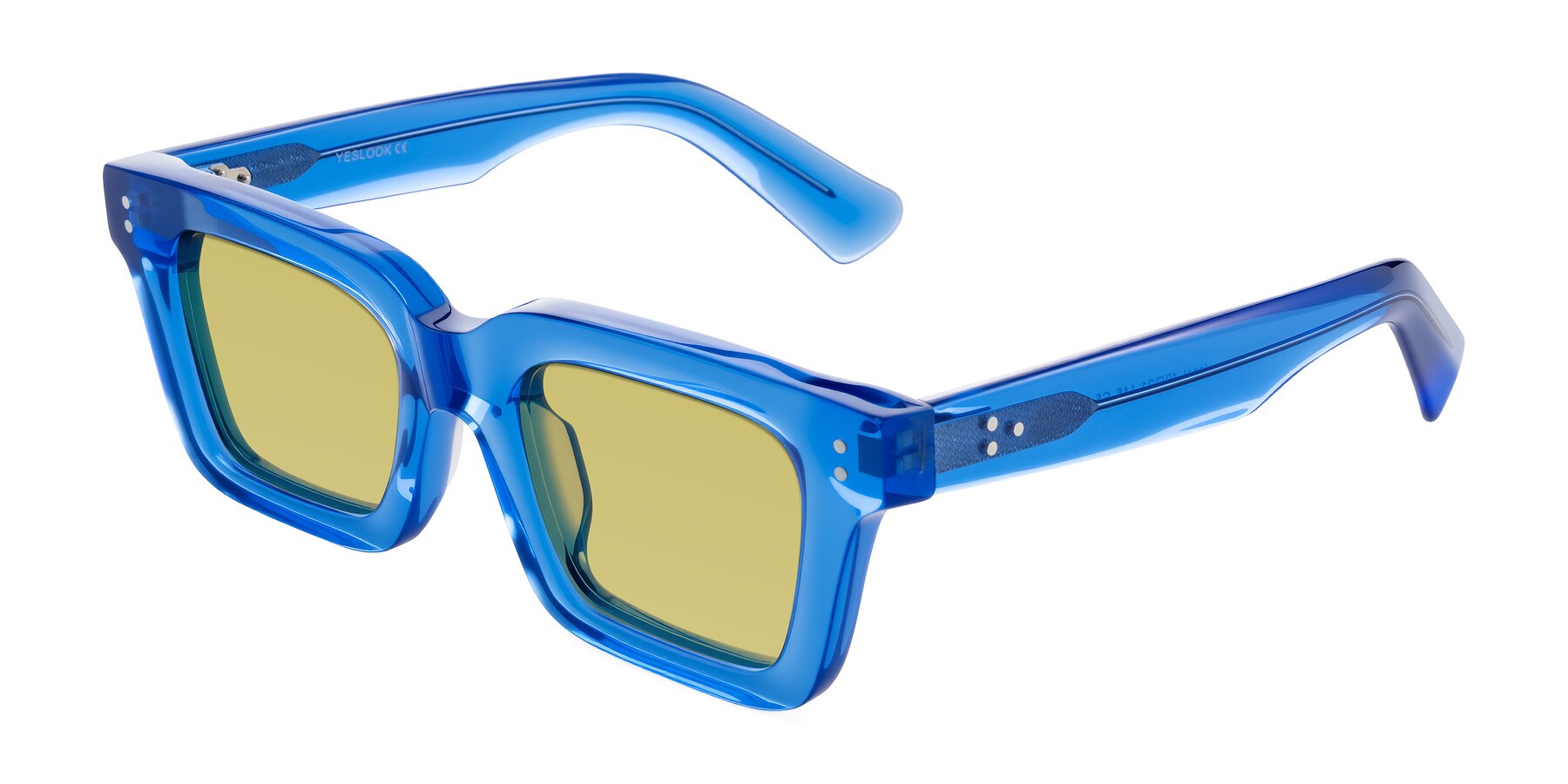 Angle of Izael in Transparent Blue with Medium Champagne Tinted Lenses
