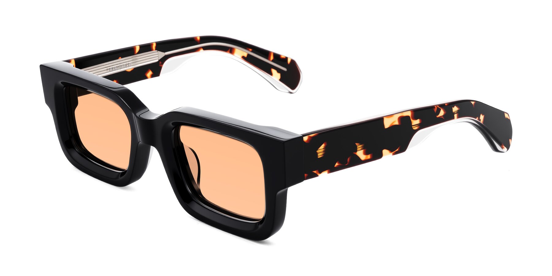 Angle of Nuria in Black/Tortoise with Light Orange Tinted Lenses