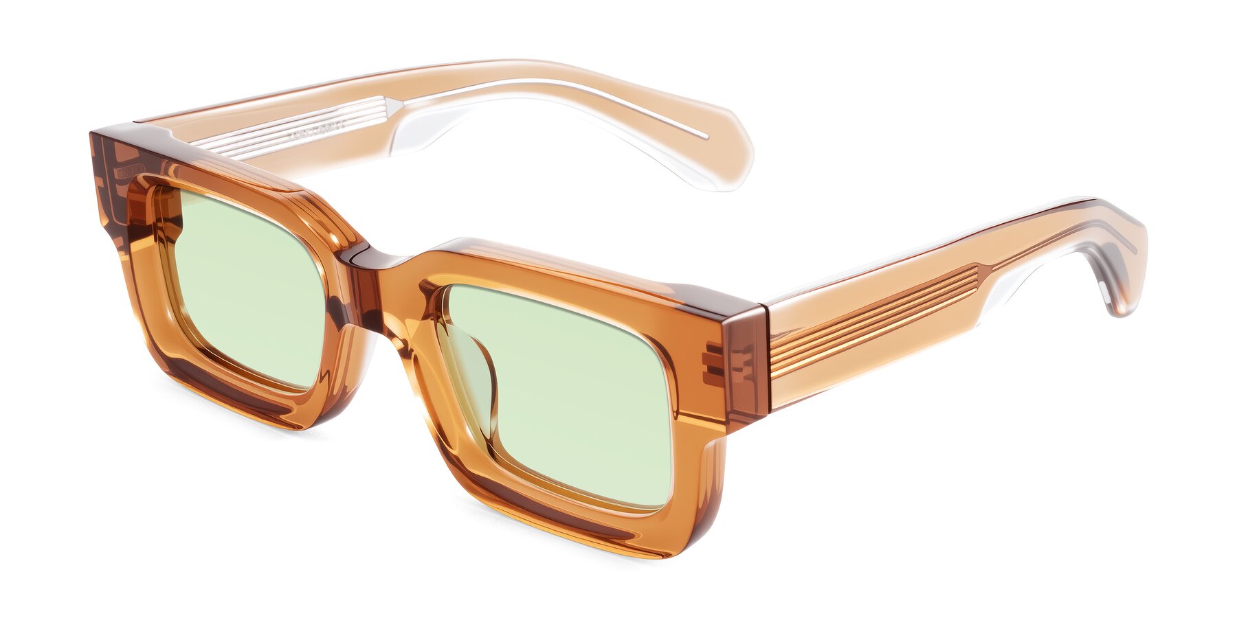 Angle of Nuria in Amber with Light Green Tinted Lenses