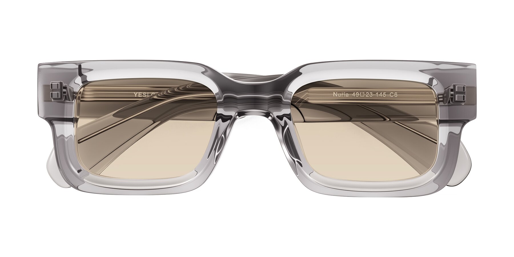 Folded Front of Nuria in Transparent Gray with Light Brown Tinted Lenses