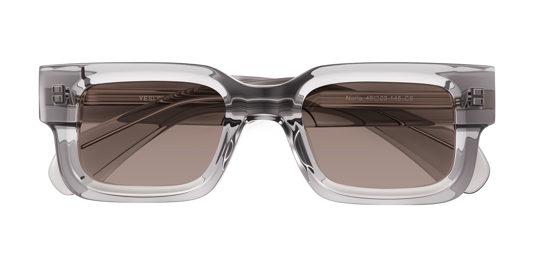 Folded Front of Nuria in Transparent Gray with Medium Brown Tinted Lenses