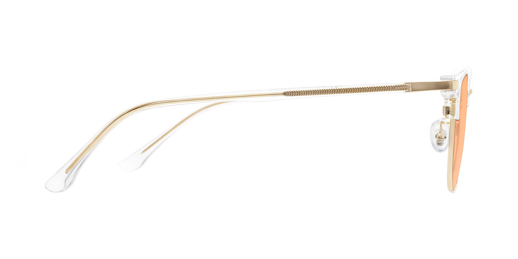 Side of Raguti in Clear/Gold with Light Orange Tinted Lenses