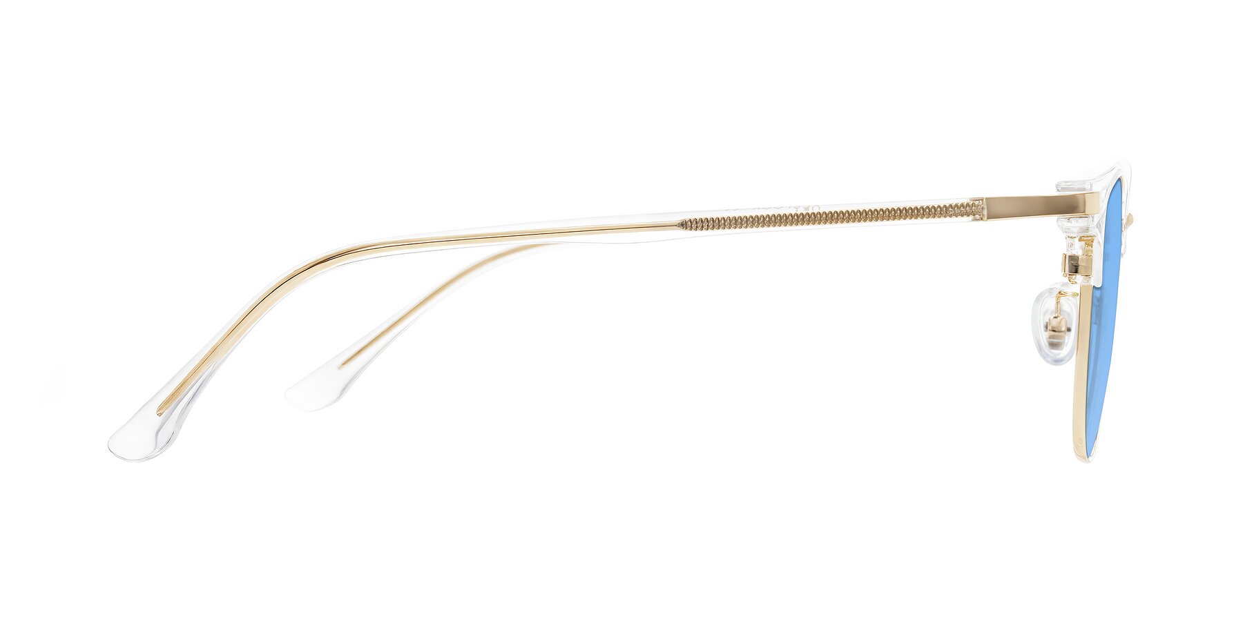 Side of Raguti in Clear/Gold with Medium Blue Tinted Lenses