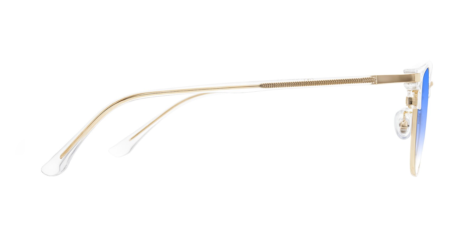 Side of Raguti in Clear/Gold with Blue Gradient Lenses