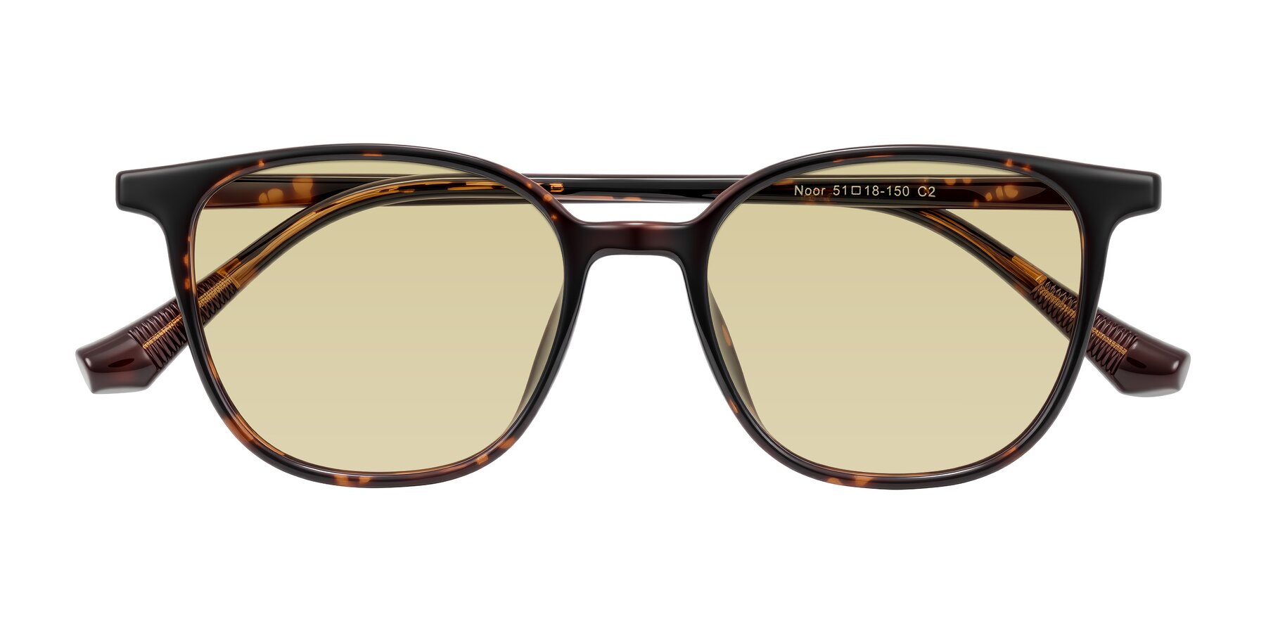Folded Front of Noor in Tortoise with Light Champagne Tinted Lenses