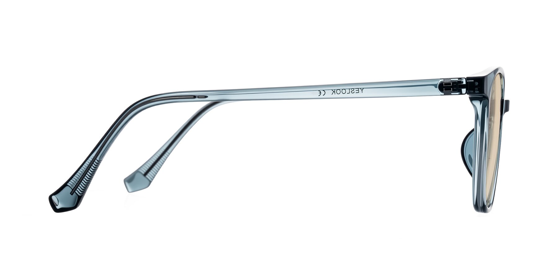 Side of Noor in Transparent Blue with Light Brown Tinted Lenses