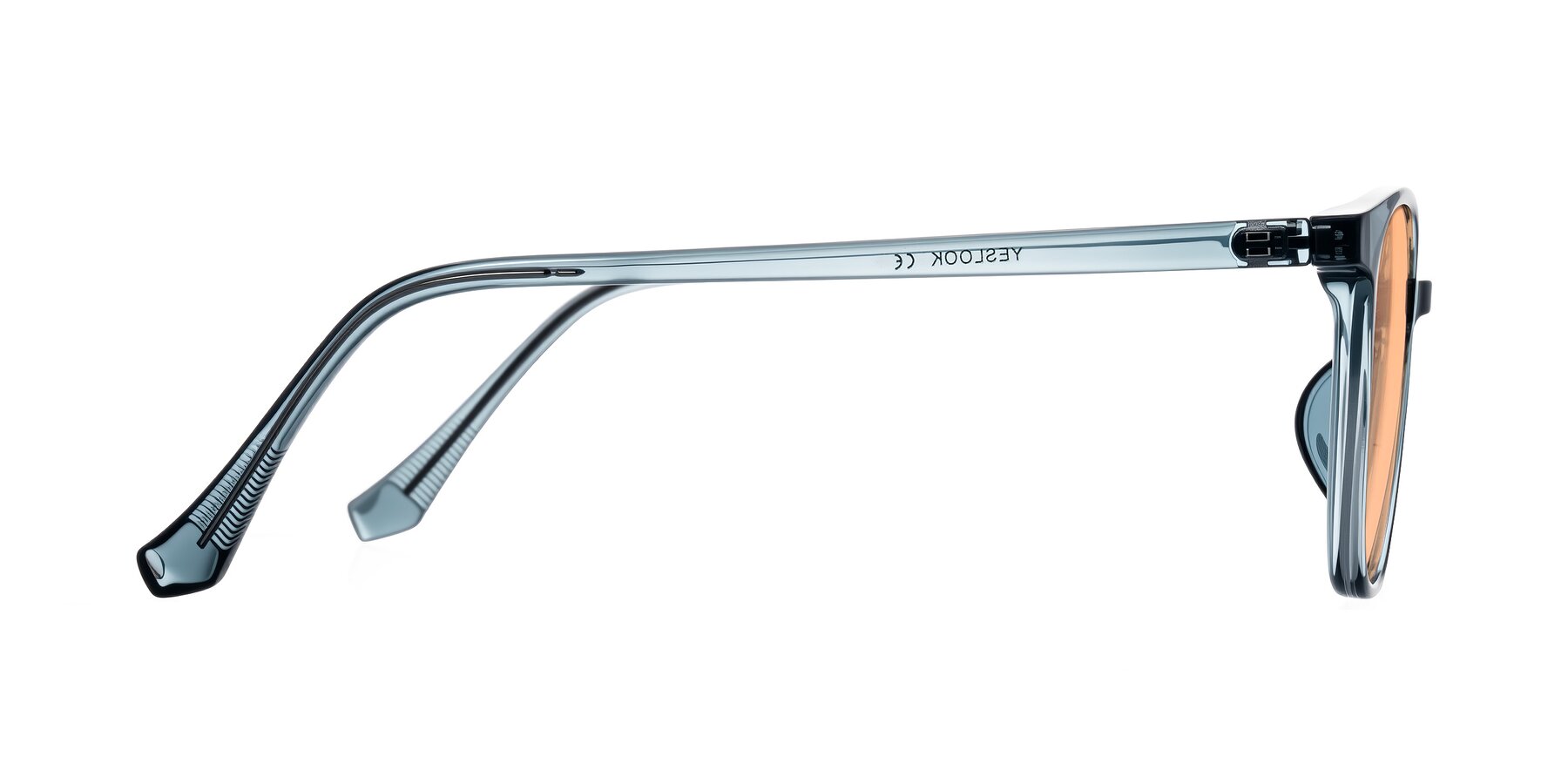 Side of Noor in Transparent Blue with Light Orange Tinted Lenses