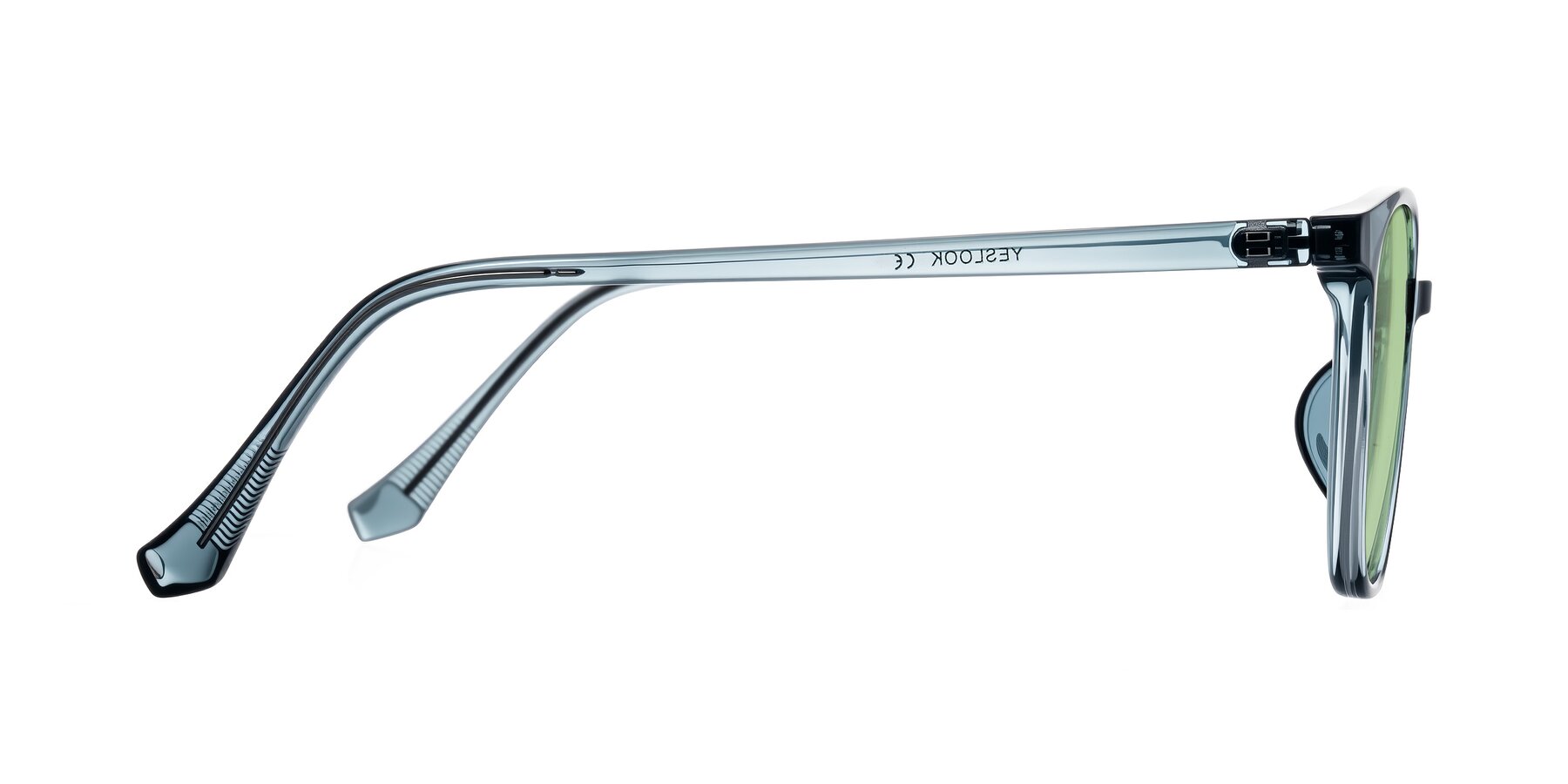 Side of Noor in Transparent Blue with Medium Green Tinted Lenses