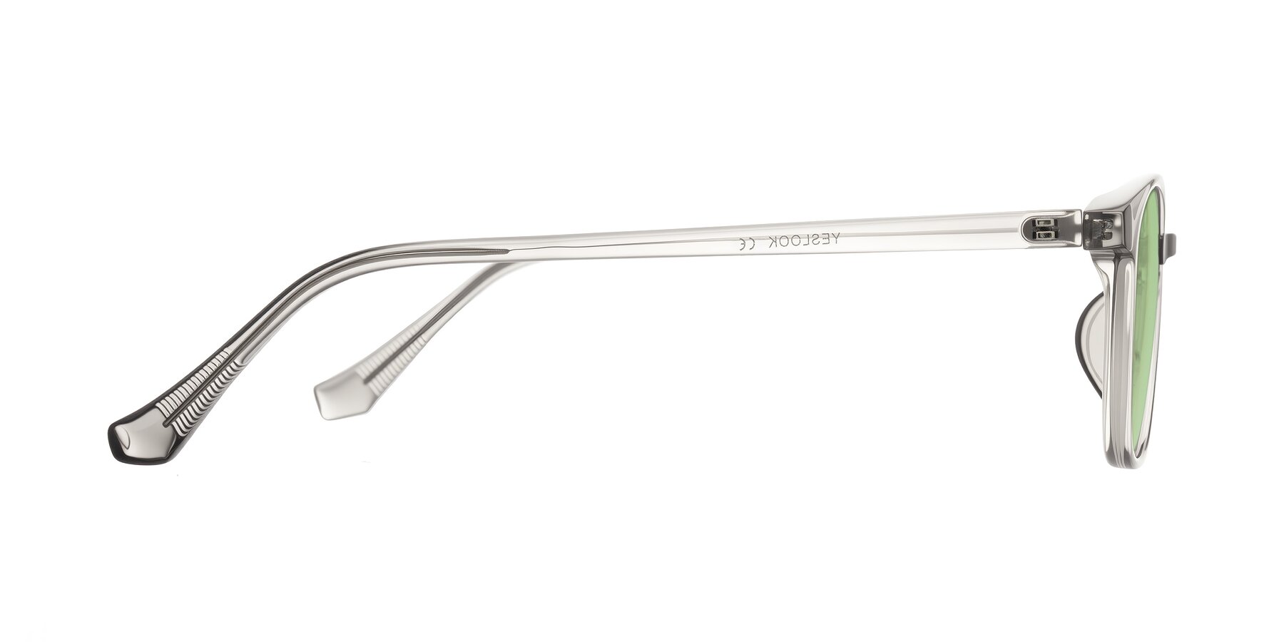 Side of Vivolo in Transparent Gray with Medium Green Tinted Lenses