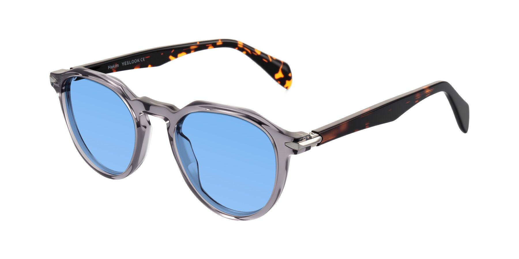 Angle of Hakim in Crystal Gray Blue/Tortoise with Medium Blue Tinted Lenses