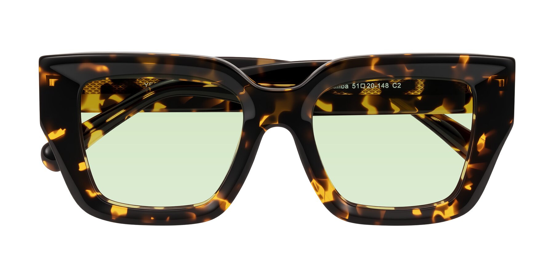 Folded Front of Simba in Tortoise with Light Green Tinted Lenses