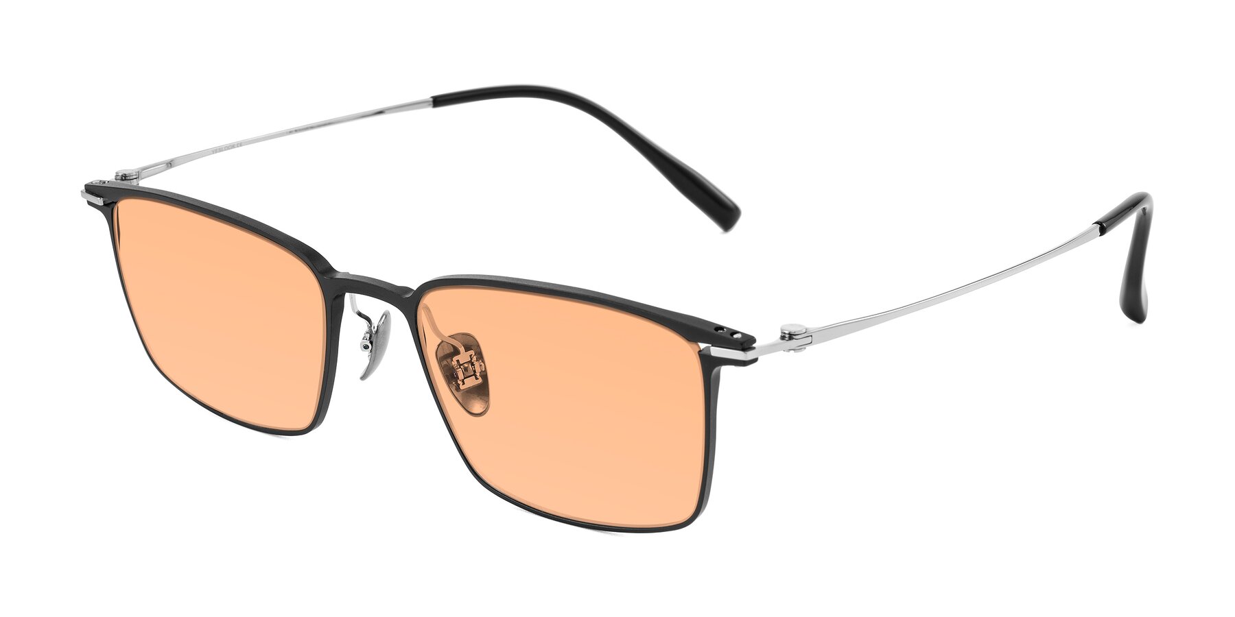 Angle of Ayla in Black/Silver with Light Orange Tinted Lenses