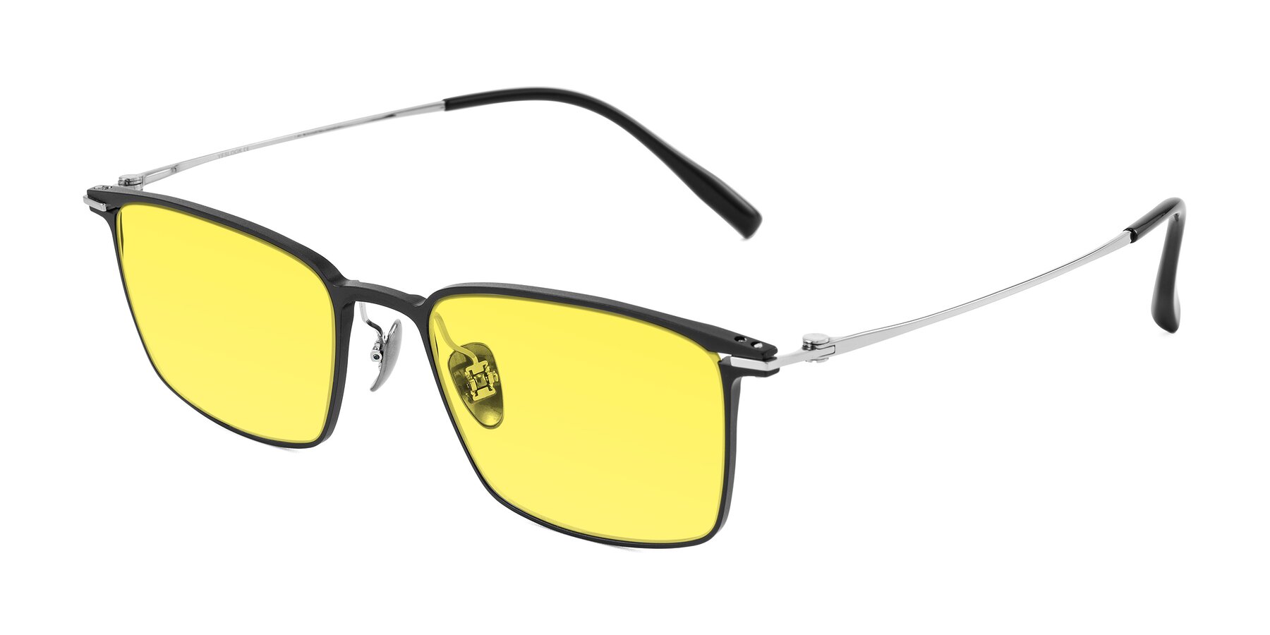 Angle of Ayla in Black/Silver with Medium Yellow Tinted Lenses