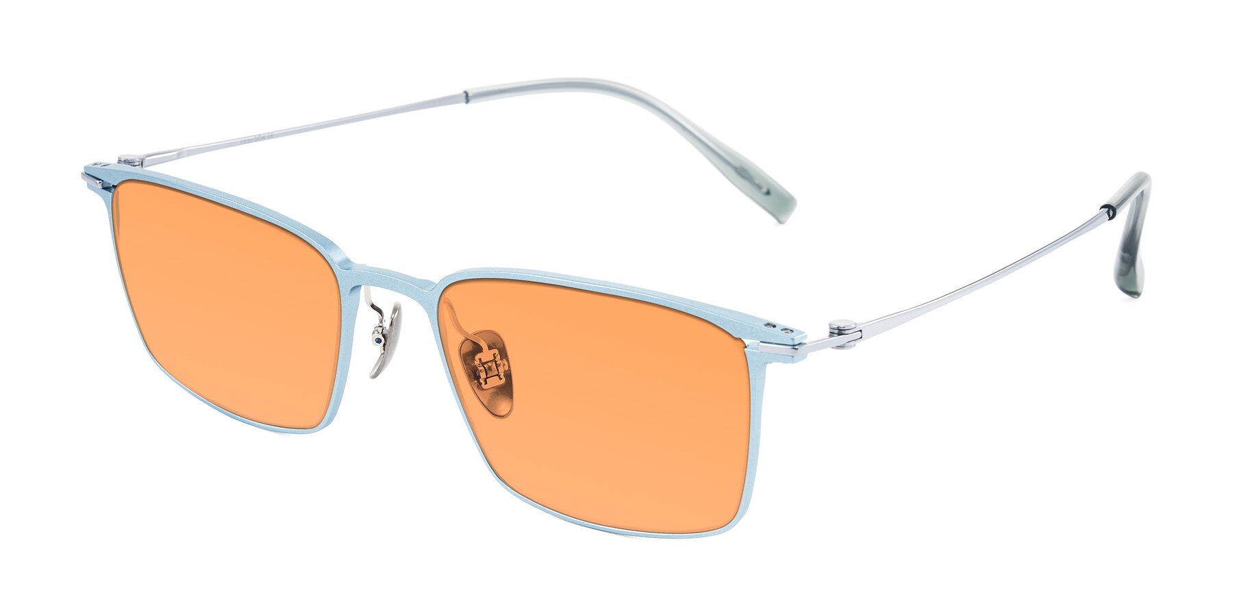 Angle of Ayla in Pastel Blue/Silver with Medium Orange Tinted Lenses