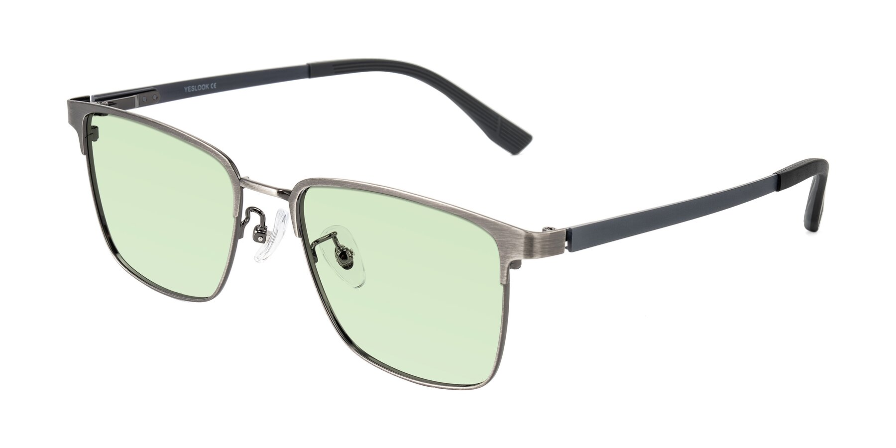 Angle of Rosita in Brushed Silver with Light Green Tinted Lenses
