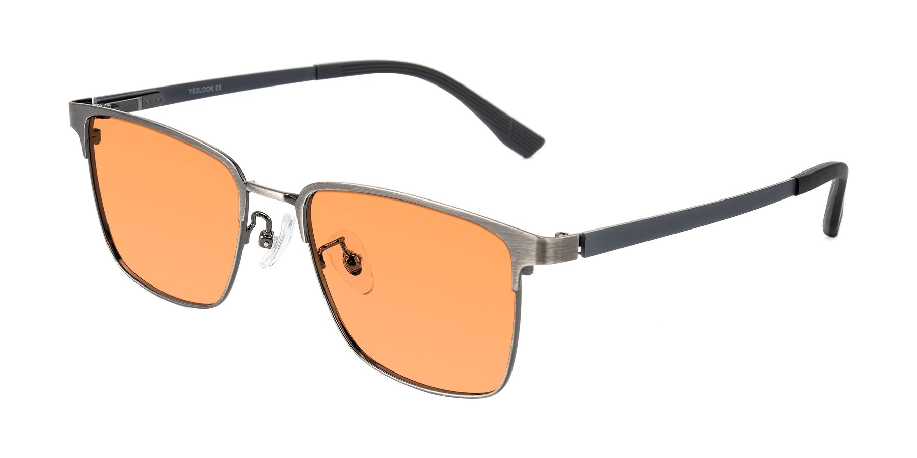 Angle of Rosita in Brushed Silver with Medium Orange Tinted Lenses