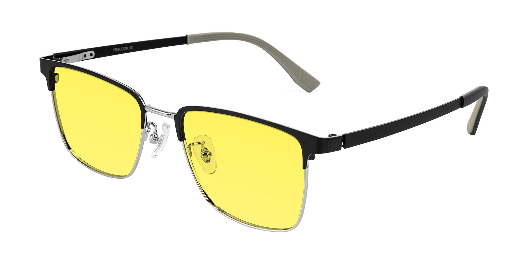 Angle of Rosita in Black/Silver with Medium Yellow Tinted Lenses